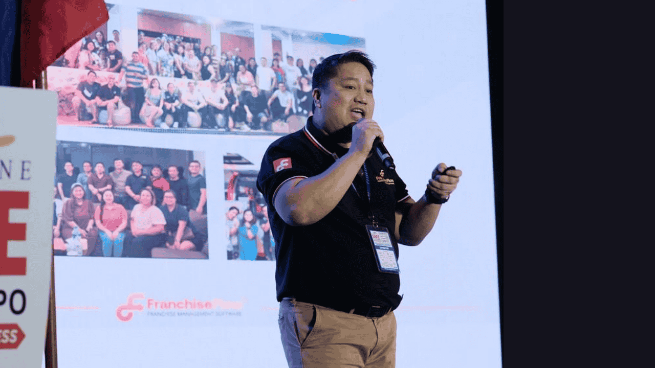 Jas Barinaga speaking about culture specific business systems at the Philippine SME Business Expo